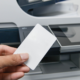 person using proximity card for enhanced print security