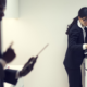 Image of three lawyers in office printing room